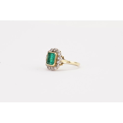 163C - An 18ct Gold Emerald & Diamond Ring set with an Emerald Cut Stone. Measuring: 7.9mm x 6.8mm. Along w... 