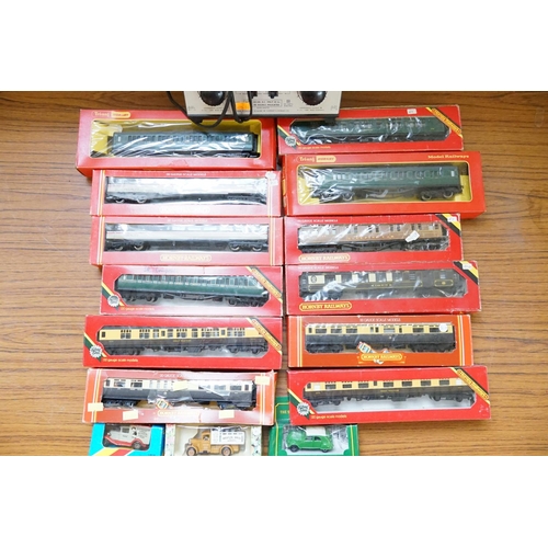 299 - A Collection of 12 x Boxed Hornby Coaches, a Duette Transformer & three boxed models.