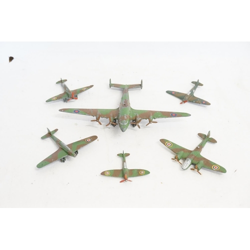 68 - Six Pre-War Dinky Camouflage Planes to include Hawker Hurricane, Blenheim Bomber, etc, in varying Co... 