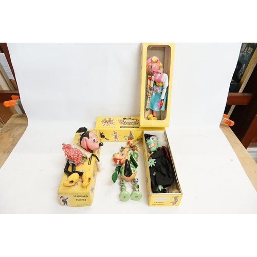 441 - Four Boxed Pelhams Puppets to include the Wicked Witch, Tyro Boy, Russian & Baby Dragon.