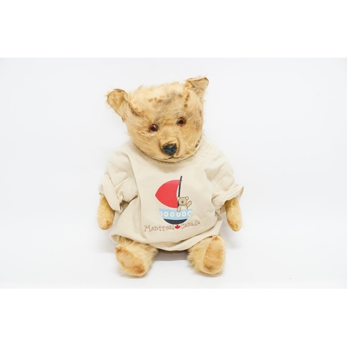 432 - A Vintage Teddy Bear dressed in a Montreal/Canada Jumper in Excellent Condition.