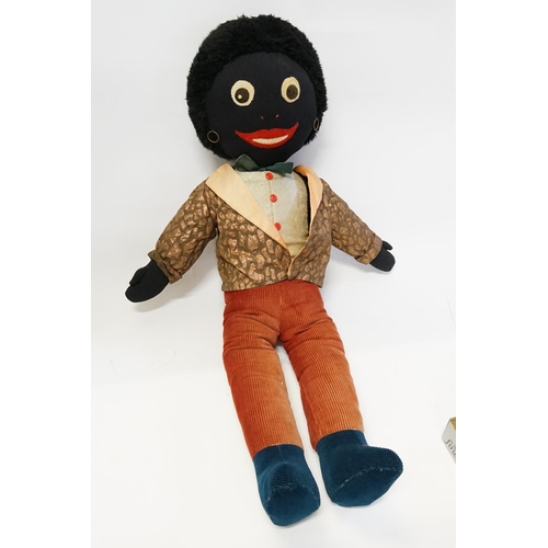 433 - A Large Golly Doll with Red Cord Trousers & Jacket. Measuring: 80cms LOng.