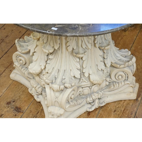 567 - An Indian Sand Stone painted multi garland inspired pedestal base fitted with a Marble Top. Measurin... 