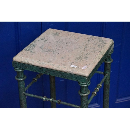 568 - A Patinated Metal Marble Topped Jardiniere Table. Measuring: 84cms high x 31cms Wide.