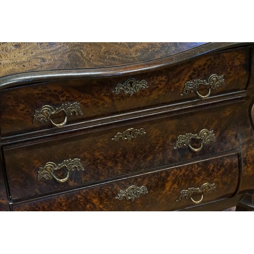 569 - A Plum Pudding Veneered Dutch Chest of Bombe Front, Serpentine Top & Resting on Carved Feet. Measuri... 