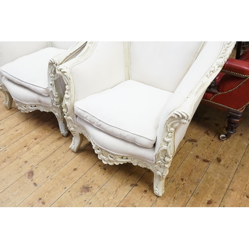 572 - A Pair of French Heavy Ornate Carved Fauteuil Armchairs upholstered in Draylon.