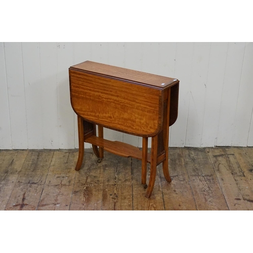 592 - An Edwardian Satin Walnut Sycamore  & Ebony Banded Sutherland Table. Measuring: 60cms long x 18cms a... 