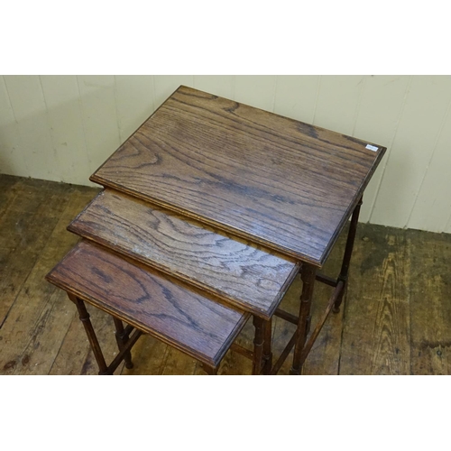 593 - A Set of Three Oak Graduated Tables.