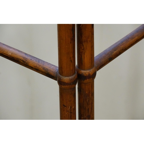 594 - A Victorian Pitch Pine Folding Towel Airer. Measuring: 60cms across x 158cms. (Closed).