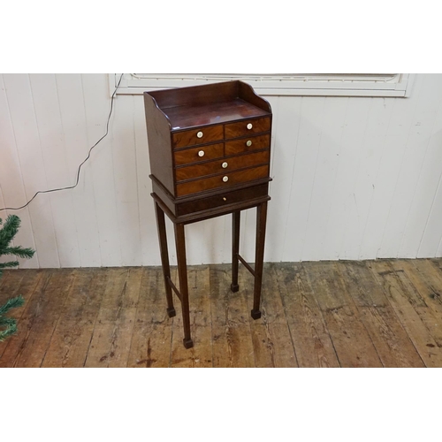 597 - A multiple draw side table.