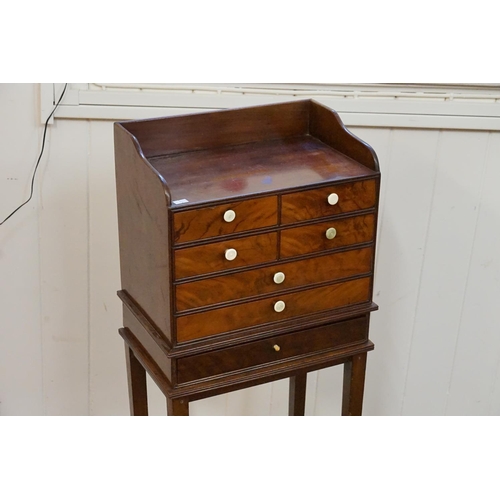 597 - A multiple draw side table.