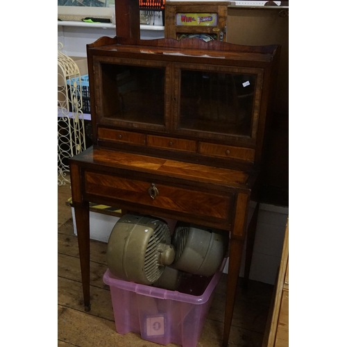 586 - A Ladies Continental Desk fitted with a glazed top section, three drawers above one long drawer, inl... 