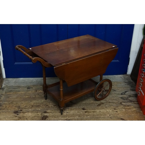 579 - A Stained as Mahogany Dinner Wagon with Drop Down Flaps. Measuring: 77cms long x 49cms across x 62cm... 