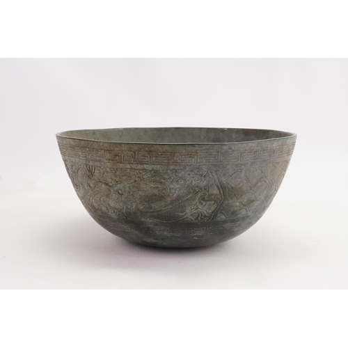 835 - A Japanese Cast Dragon & Phoenix in a Greek Key pattern Offering Bowl. Measuring: 25cms across x 12c... 