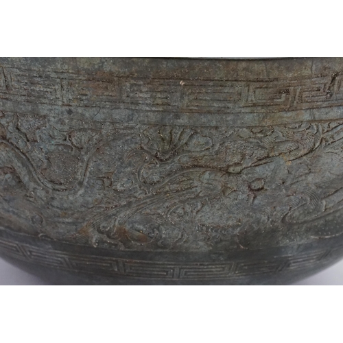 835 - A Japanese Cast Dragon & Phoenix in a Greek Key pattern Offering Bowl. Measuring: 25cms across x 12c... 