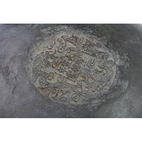 835 - A Japanese Cast Dragon & Phoenix in a Greek Key pattern Offering Bowl. Measuring: 25cms across x 12c... 