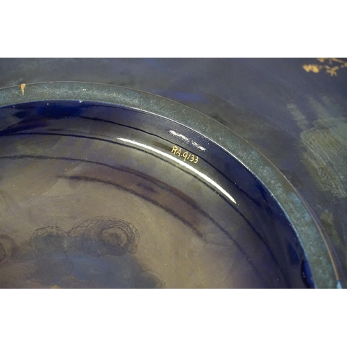 724 - A Blue Glazed Gold Burnished Floral decorated Centre Bowl. Measuring: 38cms across. Along with Three... 