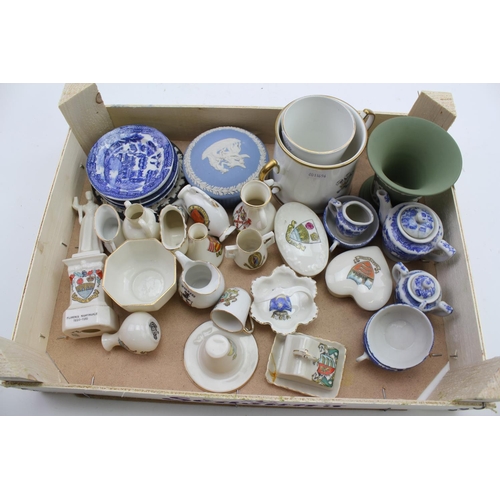 734 - A Florence Nightingale Crested Statue along with various crested china, Childs Blue & White Tea Set,... 