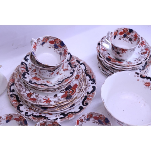 736 - A quantity of Rust Blue & Brown Edwardian Dinner China.