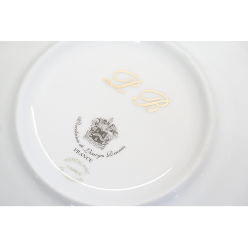 755 - A Large Limoges “Birds of Paradise” Dinner Set consisting of a Tureen, Bowls, Soup Bowls, Sandwich P... 