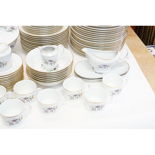 755 - A Large Limoges “Birds of Paradise” Dinner Set consisting of a Tureen, Bowls, Soup Bowls, Sandwich P... 