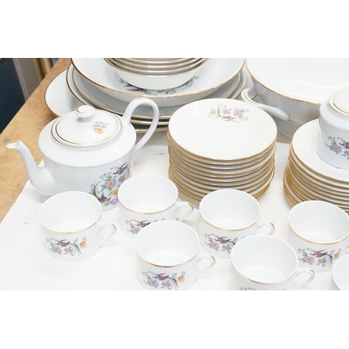 755 - A Large Limoges “Birds of Paradise” Dinner Set consisting of a Tureen, Bowls, Soup Bowls, Sandwich P... 