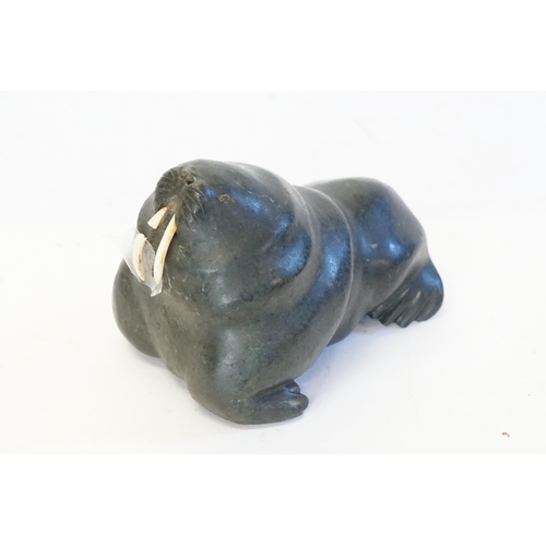 999 - An Inuit Stone Carving of a Walrus with its Original Tusks. AF.