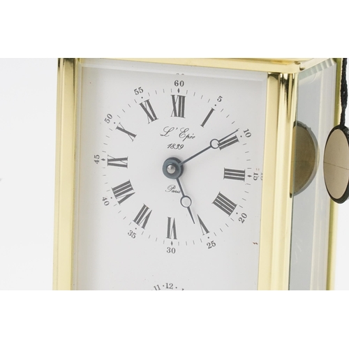 222 - A Brass Cased Four Plate Carriage Clock by 