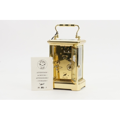 222 - A Brass Cased Four Plate Carriage Clock by 