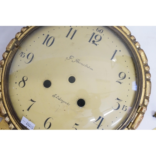 223 - A Swedish design Gilt Wood  Wall Clock Case decorated in the Rococo style with a movement by 