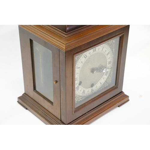 226 - A Georgian design Bracket Clock contained in a Mahogany Case, Visible glass side panels & the moveme... 