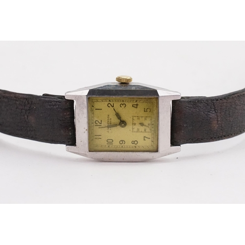 190 - A J W Benson watch, in a stainless steel Dennison case, brown leather strap.