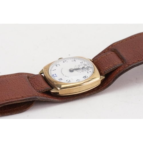 196 - A 9ct gold Rotary mechanism wrist watch, in a Dennison case. White dial and sub second dial, on a br... 