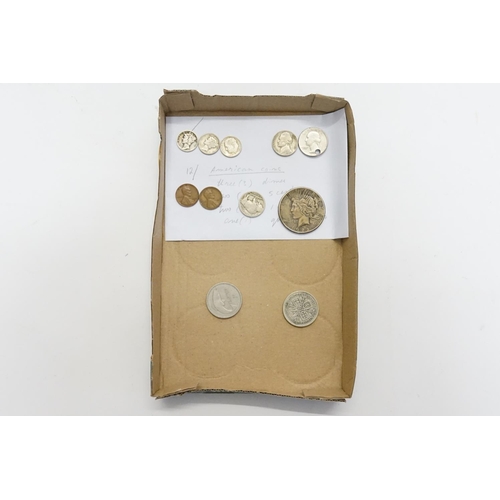 238 - A Small Collection of Coins to include an American Silver Dollar dated 1922, Three Early Dimes, Two ... 