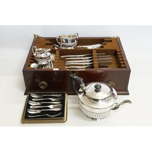 56 - A Community Silver Plated Canteen, a Three Piece Silver Plated Tea Set, etc.