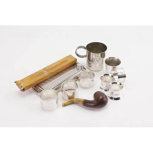 80 - A collection of items to include two silver hallmarked napkin rings (one marked 800) along with othe... 