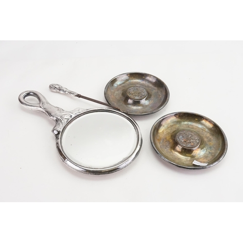 49 - A pair of Mappin & Webb St Christopher dishes, along with a hand held mirror and hook.