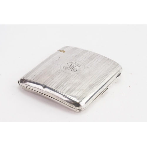 9 - A Silver Cigarette case with engraved decoration. Weight: 127grams.