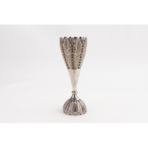 32 - A Chinese silver vase, decorated with floral relief. 183 grams.