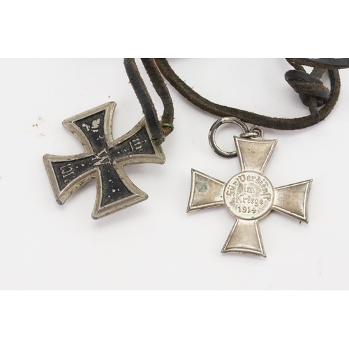 329 - A German design Iron Cross & a Red enamelled Maltese Cross with a Double Headed Eagle entitled 