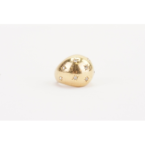 84 - A high carat gold and diamond set ring, in the bulbous design. Set with 9 rose cut diamonds. Weight ... 