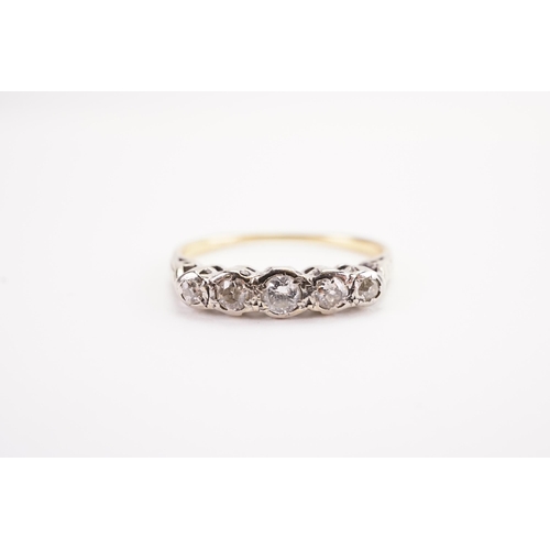 122 - A 18ct gold and platinum topped five stone diamond ring. Weight 2.4g. Size Q.