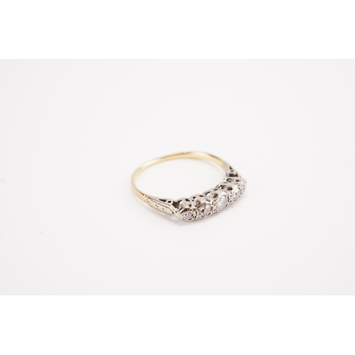 122 - A 18ct gold and platinum topped five stone diamond ring. Weight 2.4g. Size Q.