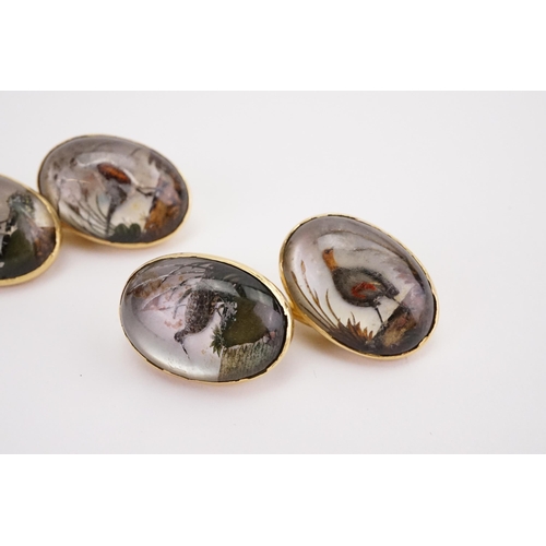 142 - A pair of 18ct gold game bird reverse painted crystal intaglio or Essex crystal chain link cufflinks... 