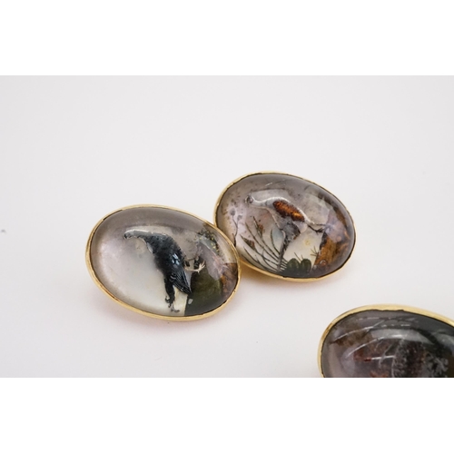 142 - A pair of 18ct gold game bird reverse painted crystal intaglio or Essex crystal chain link cufflinks... 