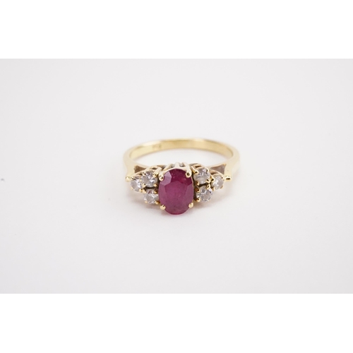 152 - A 18ct gold ruby and diamond set ring. Weight 3.4g. Size L.