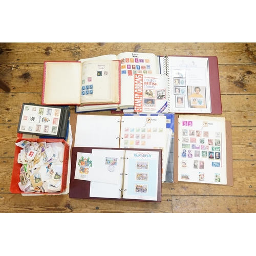 276 - A Large Collection of Stamps some in Albums, some loose from the U.K.  China, Spain, Canada, etc. Ne... 