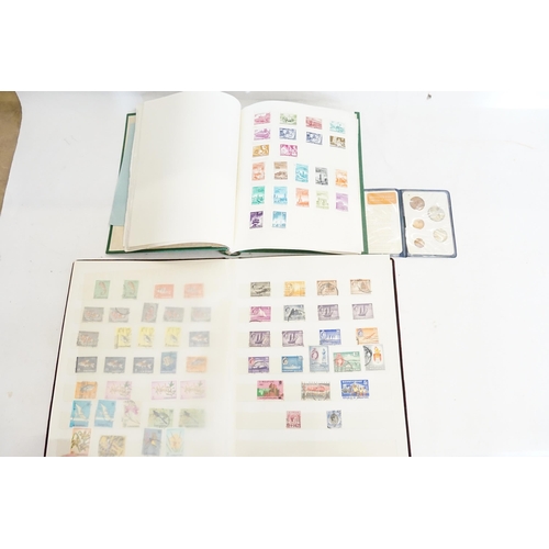 282 - Two Stamp Albums along with a Decimal Coin Set.