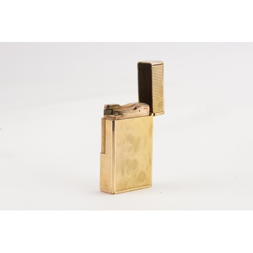 295 - A gold plated Dunlop lighter marked Paris 8509bh.