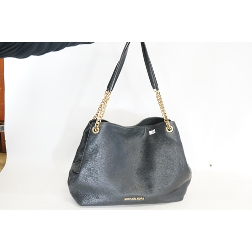 387 - Michael Kors black leather handbag with chain shoulder strap.